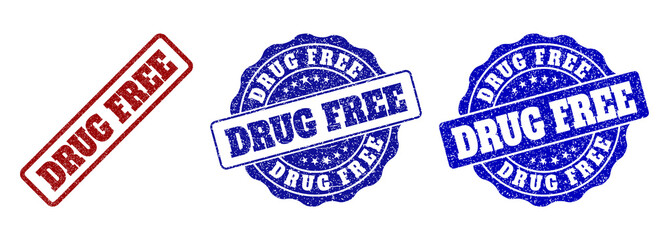 DRUG FREE grunge stamp seals in red and blue colors. Vector DRUG FREE labels with dirty style. Graphic elements are rounded rectangles, rosettes, circles and text captions.