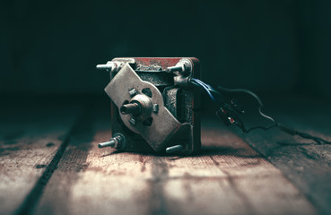 old electric motor on old wood background
