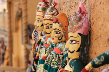 Rajasthani puppets (Kathputli) have been displayed on a shop at Jaisalmer Fort, Rajasthan. Kathputli is a string puppet theatre, native to Rajasthan, India, and is the most popular form of Indian 