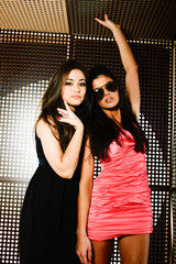 portrait of two pretty girls enjoying party, lifestyle people co