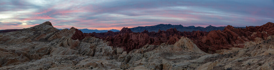 Fototapeta na wymiar Beautiful panoramic American Landscape during a cloudy sunrise. Taken in Valley of Fire State Park, Nevada, United States.