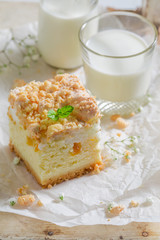 Closeup of cheesecake made of peach and crumble