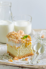 Closeup of cheesecake with fresh peach and crumble