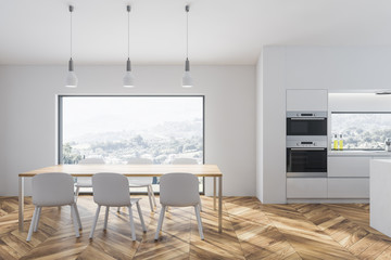 White kitchen with table