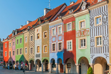 Row of colorful facade of houses on Poznan Old Market Square, Poland. © GISTEL