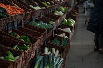 Fototapeta na wymiar fresh green vegetables on the counter of the bio store