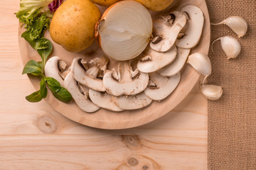Products for cooking, mushrooms, potatoes, onions, garlic, herbs