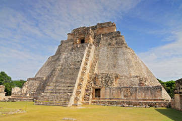 Fototapeta na wymiar The Pyramid of the Magician (Pyramid of the foreteller) a Mesoamerican step pyramid located in the ancient, Pre Columbian city of Uxmal, Mexico.