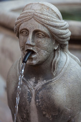 Statue-fountain on the Piazza Vecchia, upper town of Bergamo, Italy