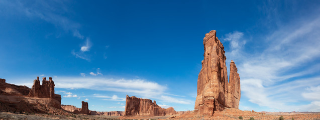 Landscape view of beautiful red rock canyon formations during a vibrant sunny day. Taken in Arches...