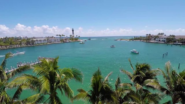 Hillsboro Inlet Lighthouse Park Aerial Rise from Palms 