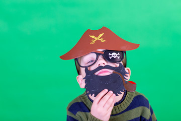 the boy in the mask of a pirate