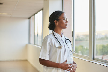 Portrait of young female african american doctor with stethoscope 

