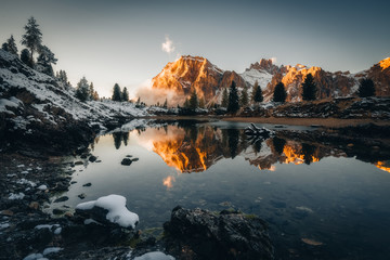 Mountains and clouds reflected on the water