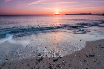 beach waves at sunrise