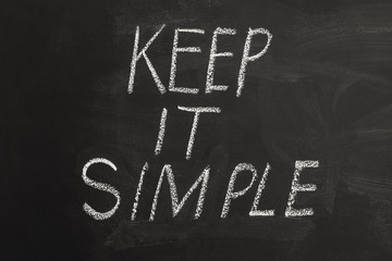 inscription keep it simple on chalkboard