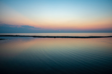 calm blue sunset over clear water in baltic sea