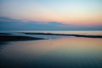 calm blue sunset over clear water in baltic sea