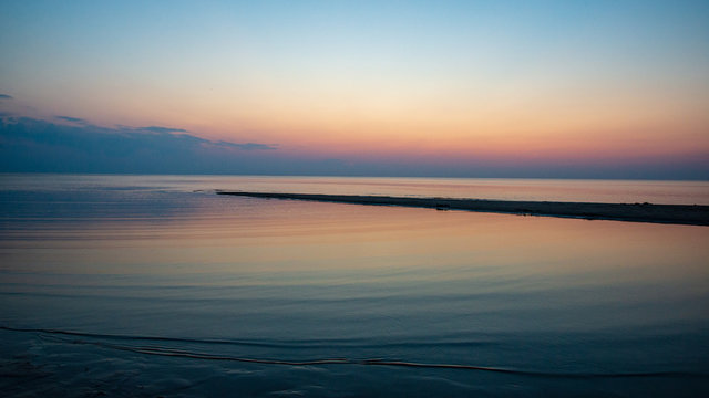 calm blue sunset over clear water in baltic sea
