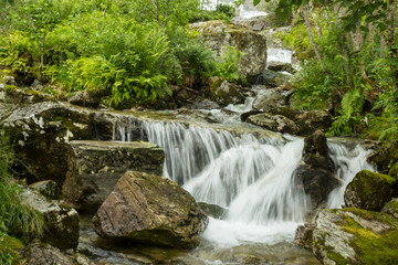 Fototapeta na wymiar Tvindefossen, one of famous waterfalls in Norway