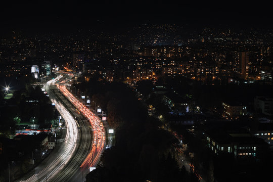 Dark night in illuminated city , Sofia, Bulgaria.
