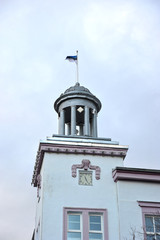 Fototapeta na wymiar Estonian flag at the city Council in Narva