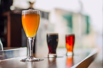 Glasses of light and dark beer