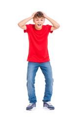 Cute child covered his head with his hands. Full length portrait of caucasian teen boy. Funny shocked teenager isolated on white background. Handsome child looking at camera.