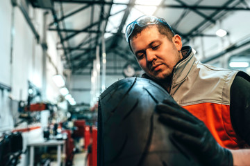Mechanic working in the motorbike workshop