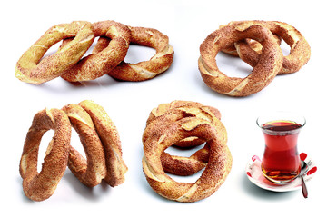 Fresh Turkish bagels and tea on a white background