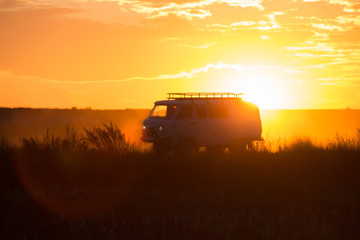 Fototapeta premium minivan is driving along a country road