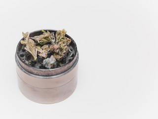 Cannabis or Marijuana Flower in Grinder