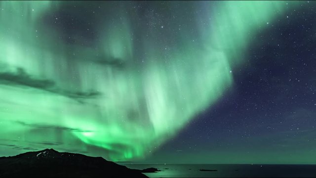 A time lapse of the northern lights and milky way over the sea and islands of Northern Norway. Captured near Rekvik on the island Kval&radic;&prod;ya, just outside Troms&radic;&prod;.