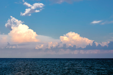 clouds over the sea. magic blue sky over the sea coast. beautiful sky. colored clouds