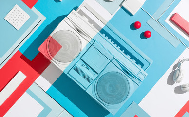 Boom box /cassette player in abstract designed composition.