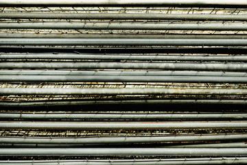 stack of metal.  Folded iron fences