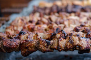 meat on grill. cooking shish kebab. grilled meats