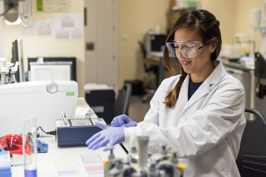 Female scientist working in a DNA lab