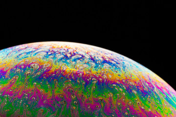 Macrophotograph of a colorful soap bubble