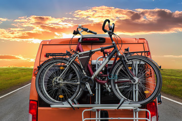 bicycles on the trunk of a minivan © Yuri Bizgaimer