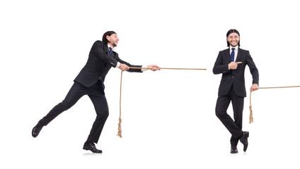 Young businessman pulling rope isolated on white