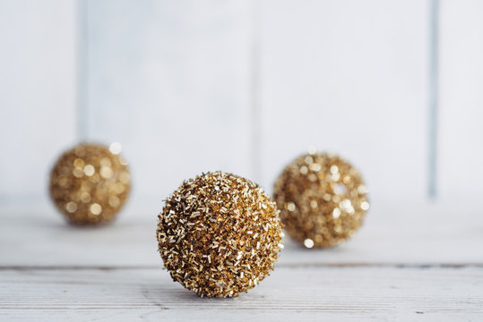 Sparkly golden Christmas tree decorations