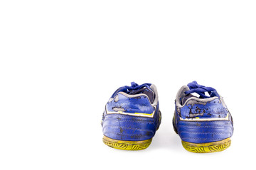 old vintage damaged futsal sports shoes on white background football sportware object isolated