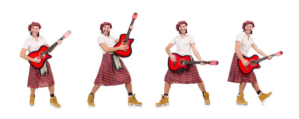 Scotsman playing guitar isolated on white