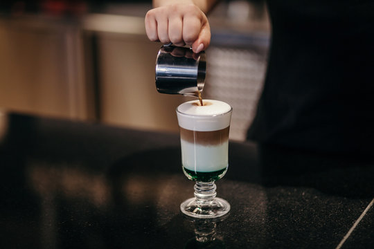 Anonymous barista preparing coffee

