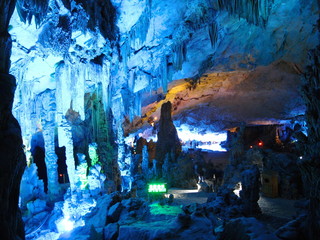Guilin,China-December 30, 2007: The Reed Flute Cave or the Palace of Natural Arts is a landmark and tourist attraction in Guilin, Guangxi, China
