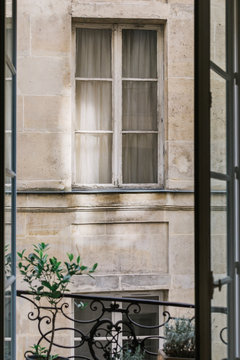 Shaft of light hitting a Paris window
