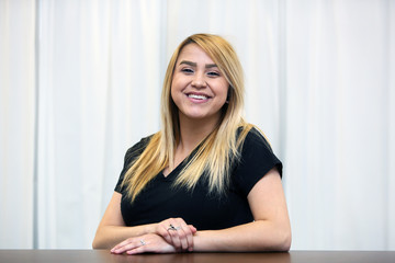 Portrait of a young smiling healthcare professional.  Female nurse