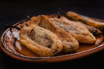 chipotles navideños with white cheese, traditional mexican food for christmas