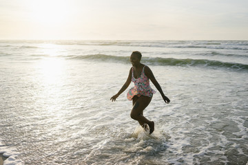 Woman running in the sea